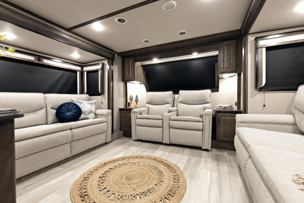 Travel trailer with a rear entertainment floor plan